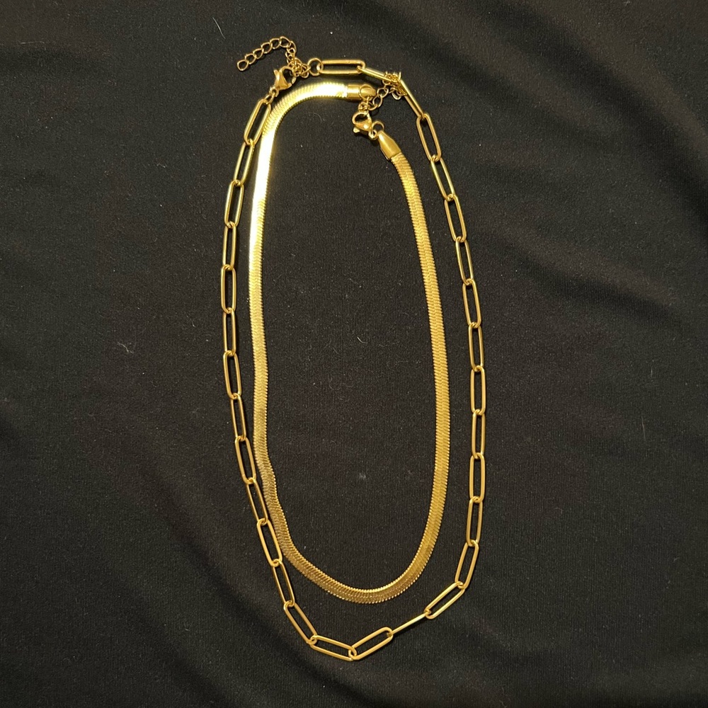 Gold layering necklaces.